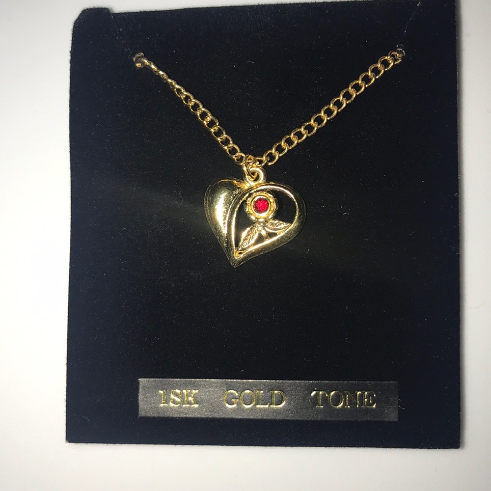 Gold tone heart necklace necklace. 17” chain.